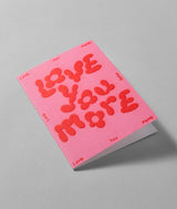 Love You More' Embossed Greetings Card